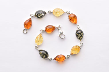 Lengyel borostyán karkötő ezüst foglalatban