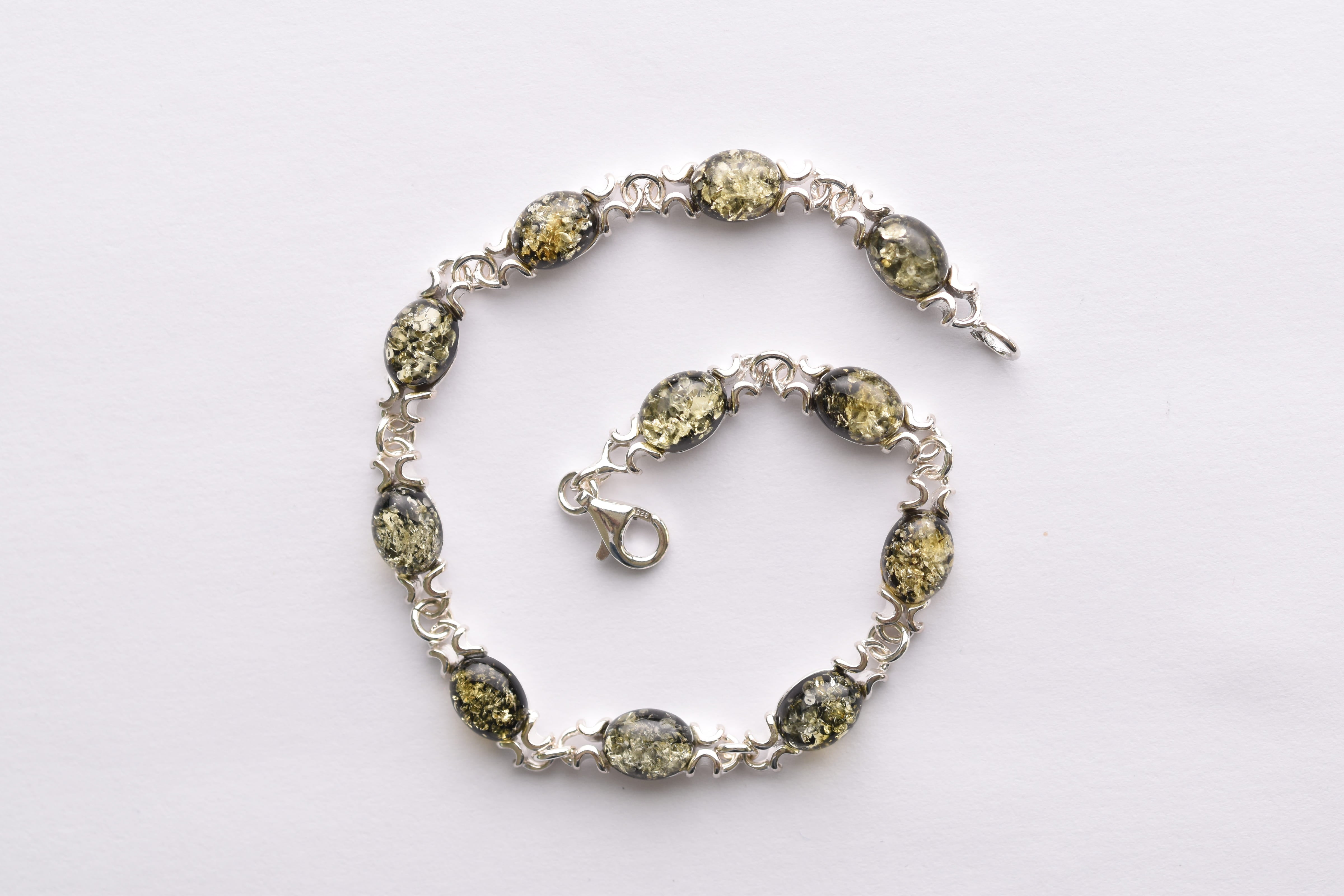 Lengyel borostyán karkötő ezüst foglalatban