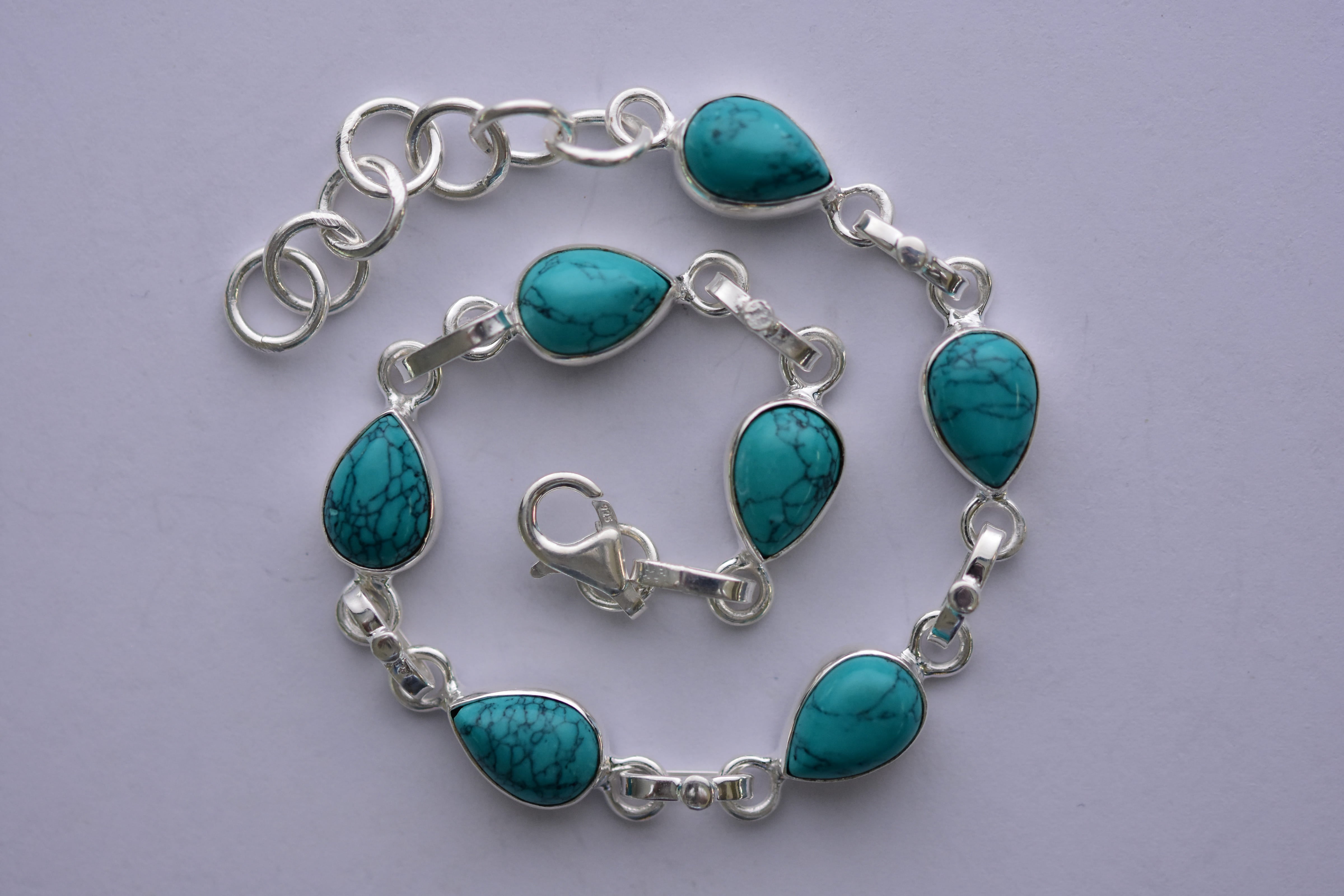 Türkiz köves karkötő ezüst foglalatban