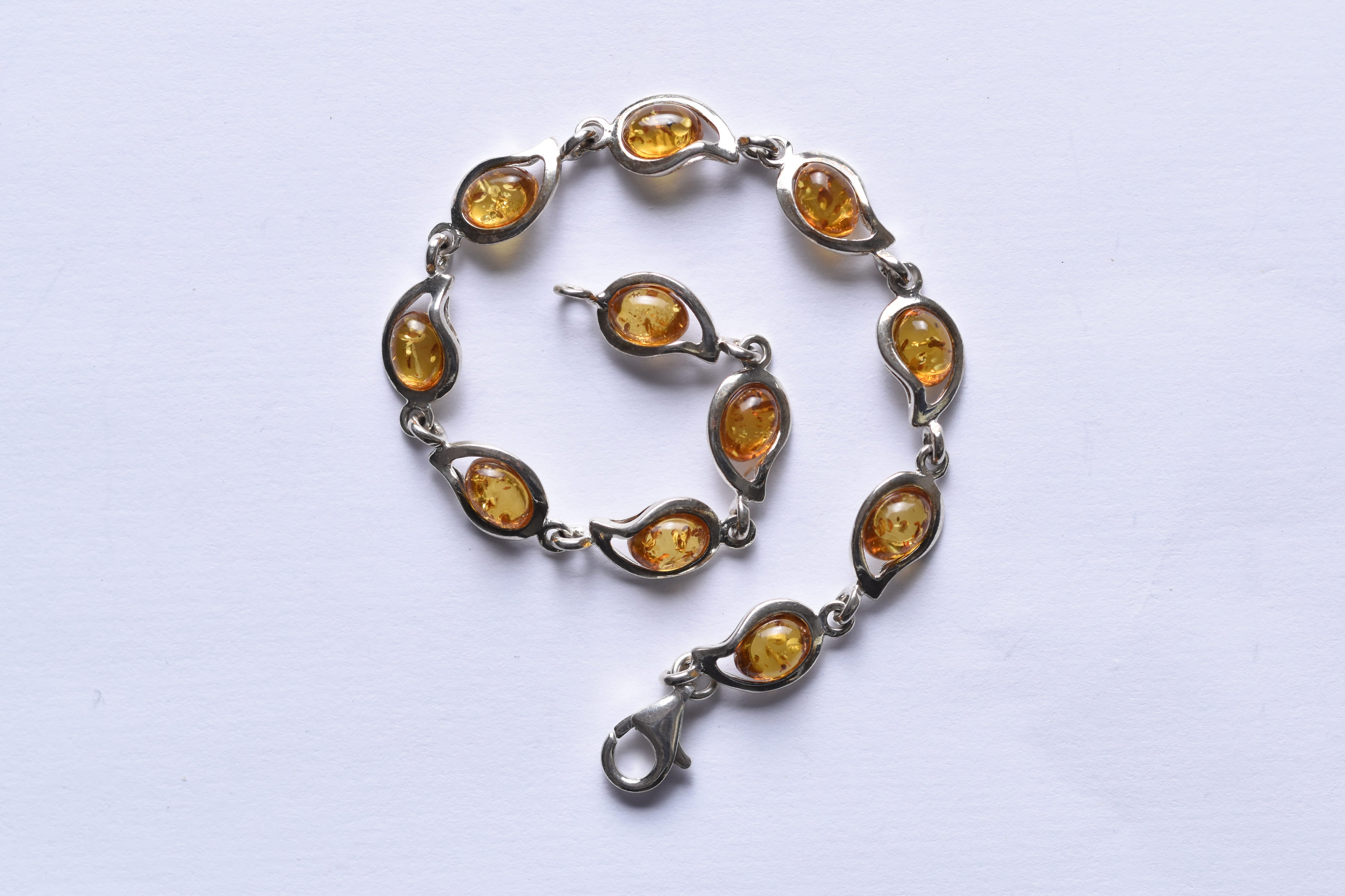 Lengyel borostyánkő karkötő ezüst foglalatban