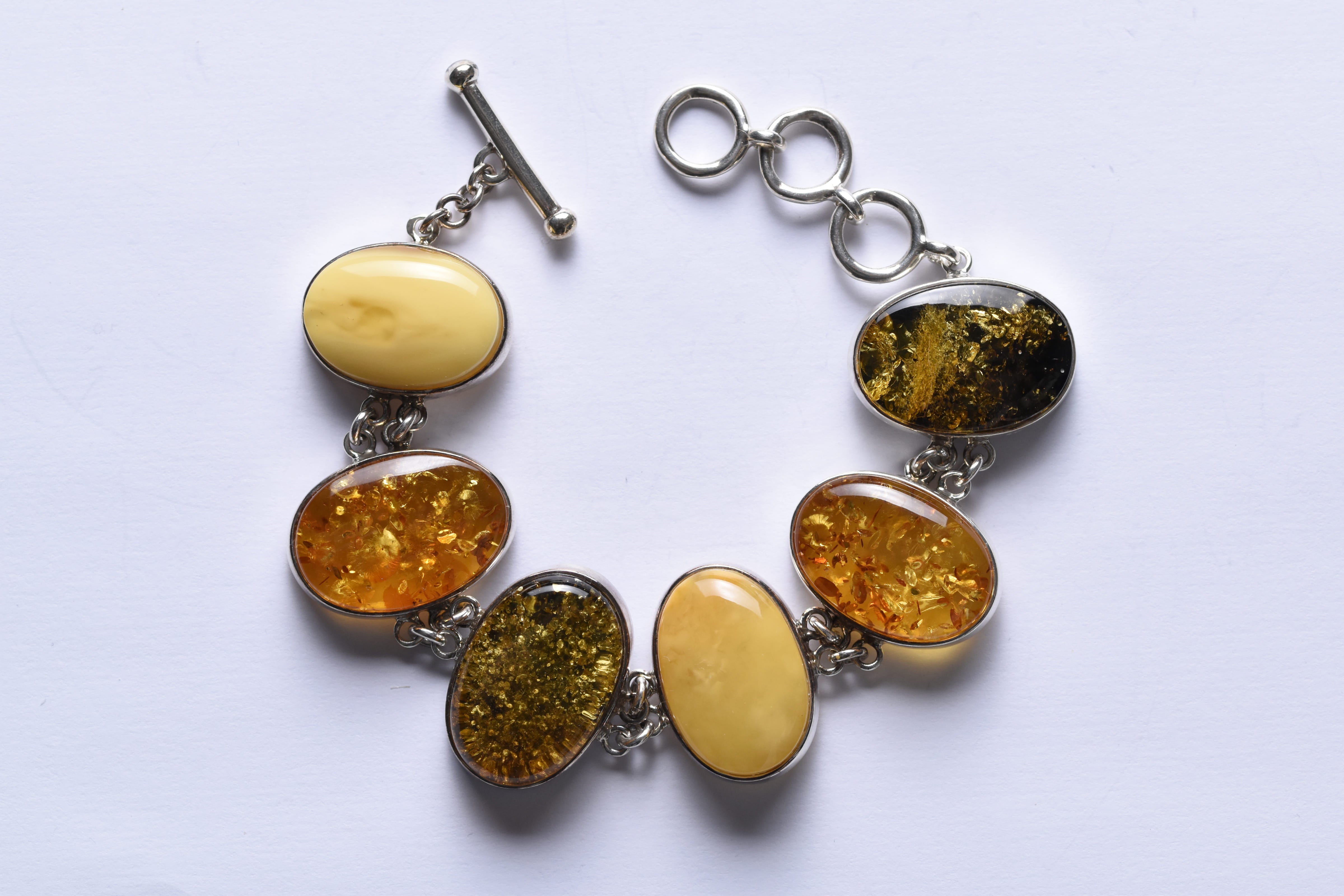 Lengyel borostyánkő karkötő ezüst foglalatban