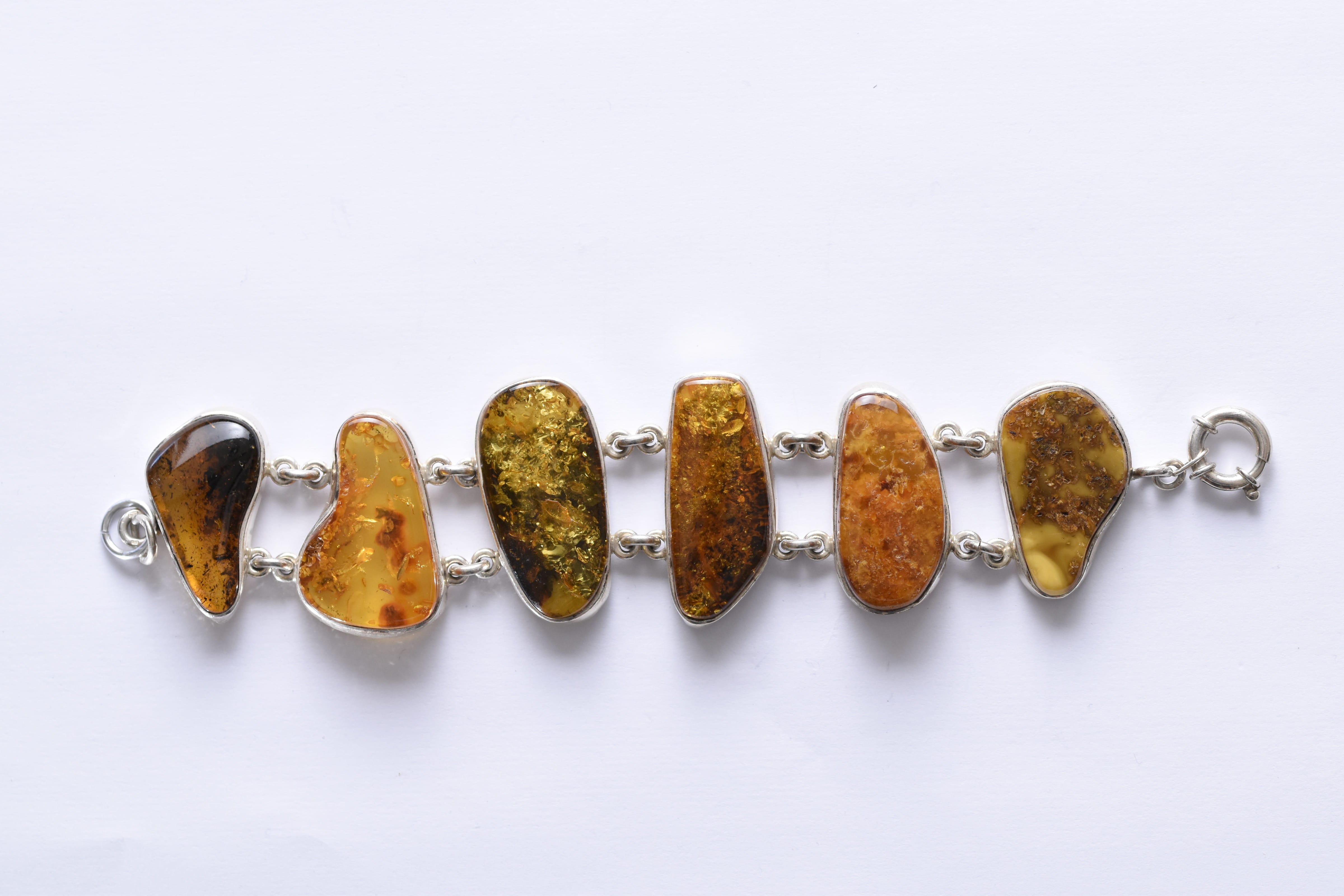 Lengyel borostyánkő karkötő ezüst foglalatban