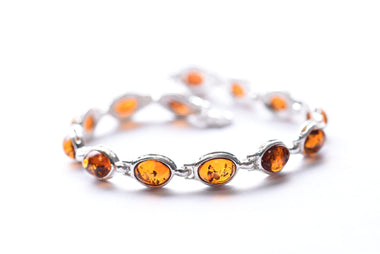 Lengyel borostyán karkötő ezüst foglalatban