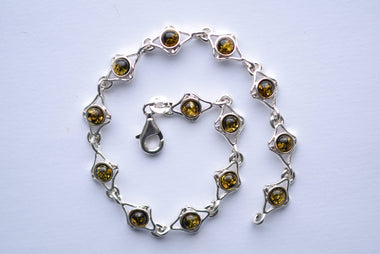 Lengyel borostyán karkötő ezüst foglalatban