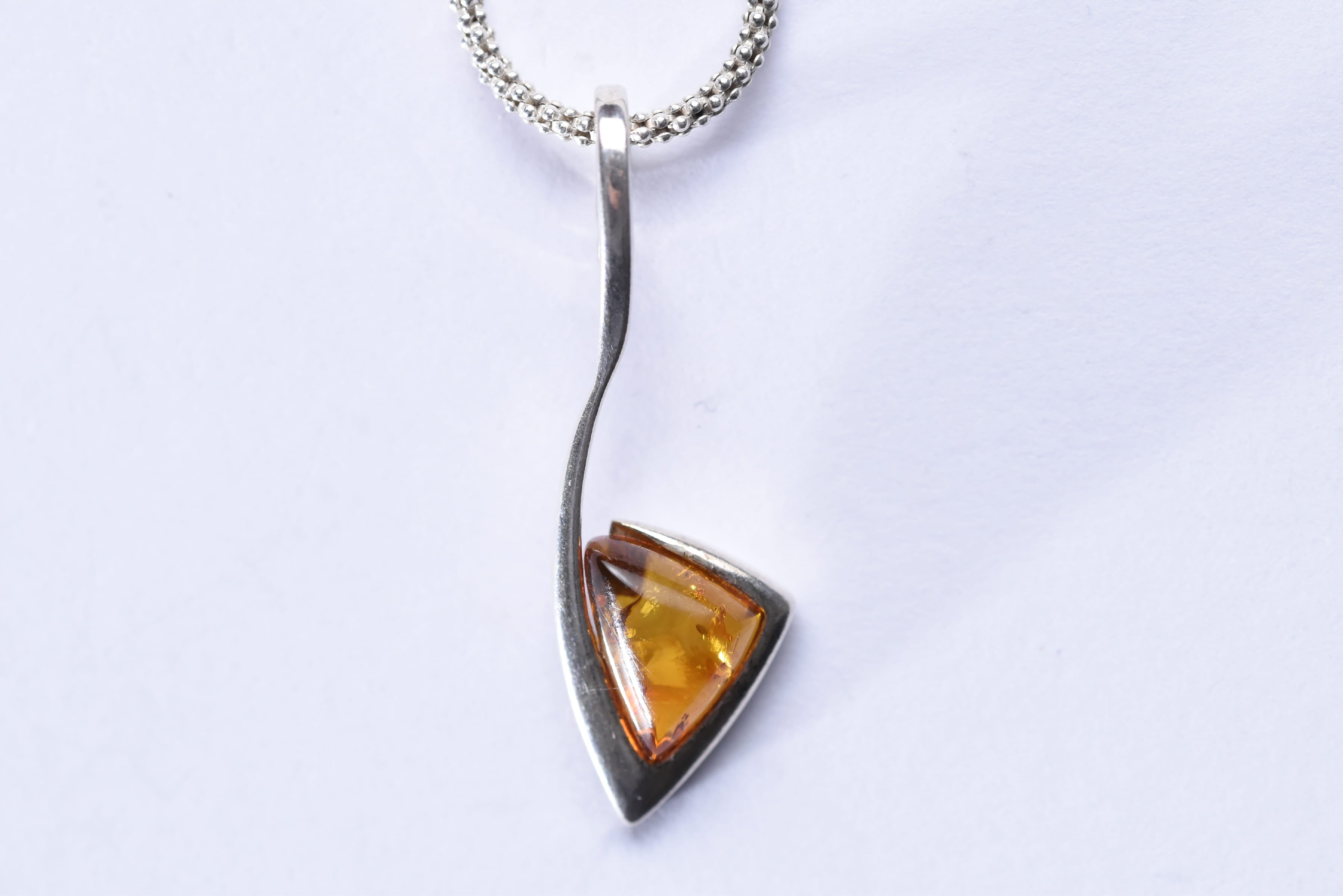 Lengyel borostyánkő medál ezüstbe foglalva