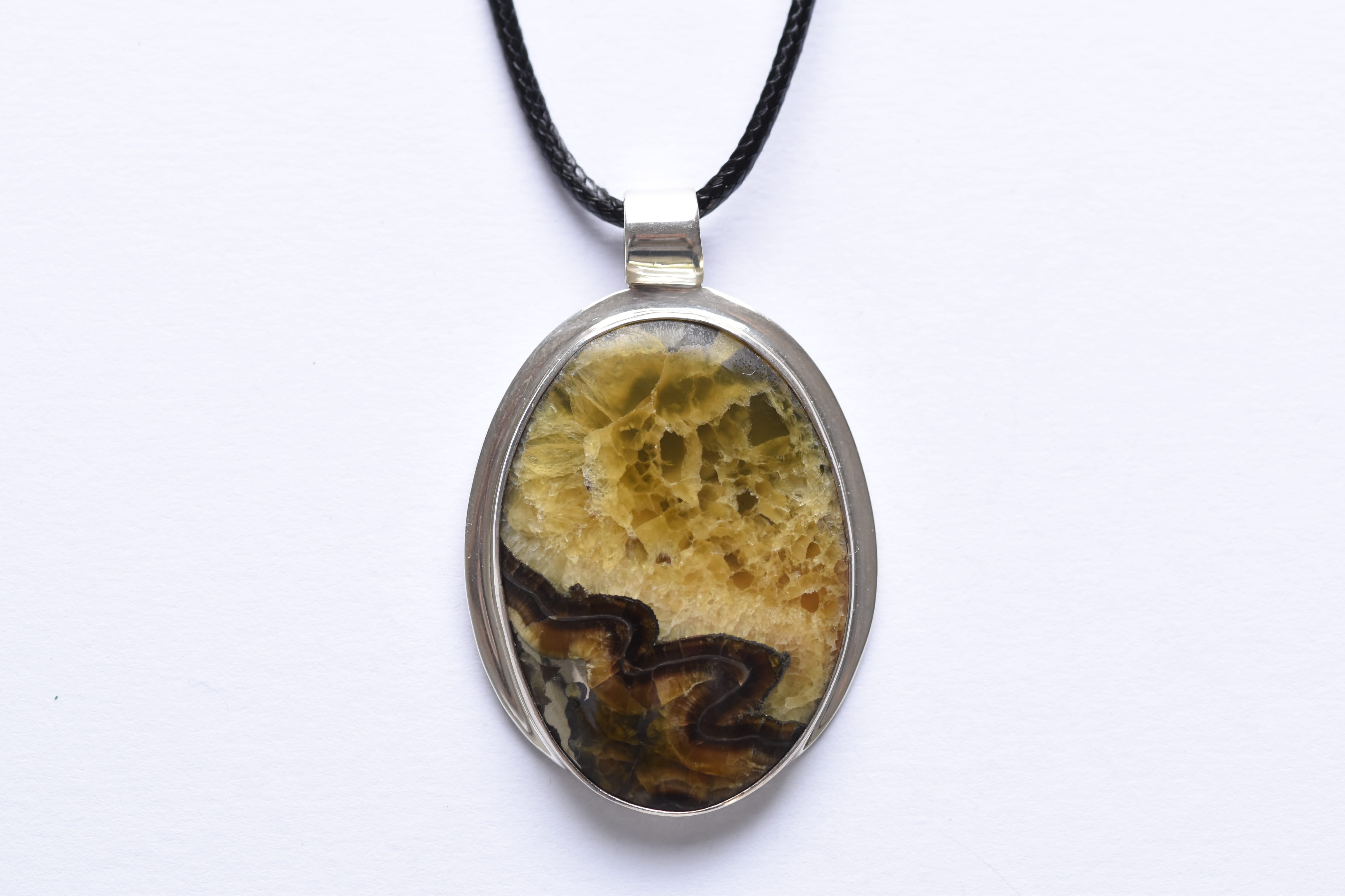 Sibrsite medál ezüst foglalatban